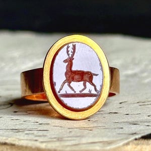 Antique Sardonyx Stag Intaglio Signet Ring in 15 Carat Gold; Circa 1890