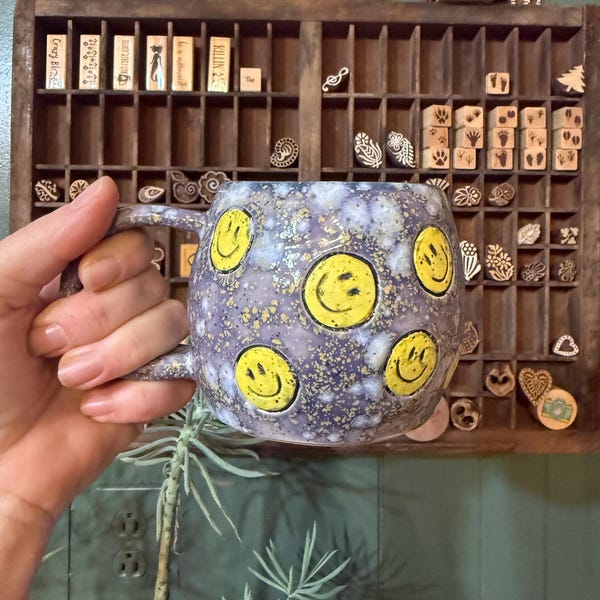 Smile / smiley face  mug . Hand made sculpted clay.