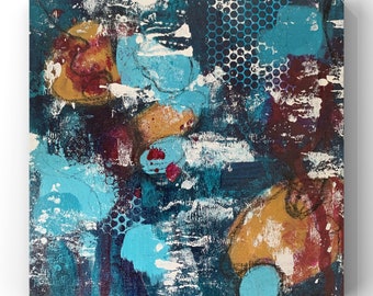 May include: Abstract painting with blue, white, and gold paint splatters on a dark blue background. The painting has a textured look and feel.