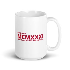 May include: White ceramic mug with a curved handle. The mug features the text "ESTABLISHED MCMXXXI RENSSELAER POLYTECHNIC INSTITUTE" in red. The mug is designed for hot or cold beverages.
