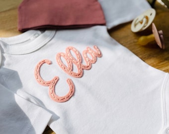 BABY NAME ONESIE® - Custom Hand Embroidered Felt Name Colored Organics® Long Sleeve Onesie® - New Baby - Newborn - Baby Shower Gift