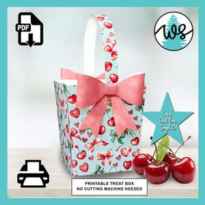 May include: A printable treat box with a light blue background, adorned with red cherries and bows. The box features a large pink bow and handle. The text "Easy Treat Box Template" is on a blue star. Fresh cherries are in the foreground.
