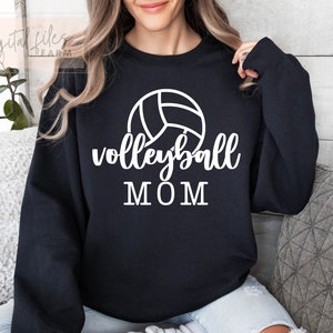 May include: Black sweatshirt with a white volleyball graphic and the text "volleyball MOM".