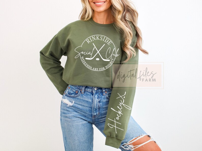 May include: A green sweatshirt with a white circle graphic that says "Rinkside Social Club" with hockey sticks crossed inside the circle. The text below the circle says "Weekends are for hockey". The sweatshirt has a white "Hockey" written on the sleeve.