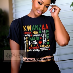 May include: Black t-shirt with a colourful graphic design featuring the word "KWANZAA" and the seven principles of Kwanzaa: Umoja, Kujichagulia, Ujima, Ujamaa, Nia, Kuumba, and Imani.