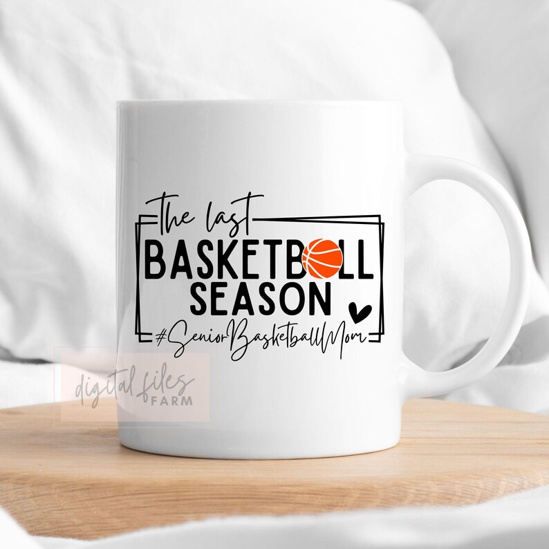 May include: White ceramic mug with a black and orange basketball design. The text reads "The last basketball season #SeniorBasketballMom".