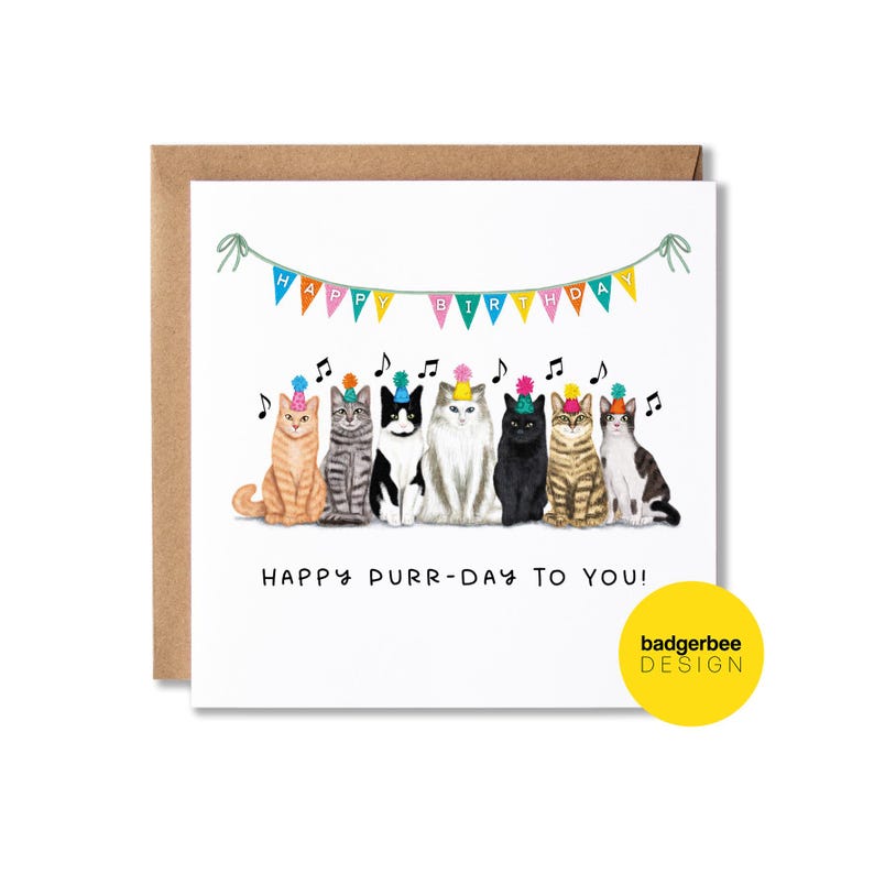 K&ouml;nnte beinhalten: Eine wei&szlig;e Karte mit einem bunten Banner, auf dem "Happy Birthday" steht, und einer Reihe von sieben Katzen, die Partyh&uuml;te tragen. Der Text unter den Katzen lautet "Happy Purr-Day To You!" und in der rechten unteren Ecke befindet sich ein gelber Kreis mit dem Text "badgerbee DESIGN".