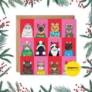 May include: A greeting card featuring a grid of illustrated cats dressed in festive attire. Each cat is set against a pink or red background. The cats wear sweaters, hats, and scarves, with text that says "MEOW" on one cat's sweater. The card has a brown border and the words "badgerbee DESIGN" on a yellow circle.