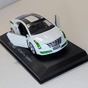 Cadillac Conver J, Luxury Die-cast (USA), Box. scale diecast model 1:43. replica american car. collectible present. gift for him. doors open