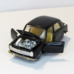 Innocenti Morris IM3. made in URSS 1980S. Vintage collectible toy car. scale diecast model 1:43. Replica mini car. Doors, hood, trunk opens
