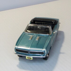 Chevrolet Camaro 1967, Ertl USA. Vintage collectible toy car. scale diecast model 1:43. Replica American sports car. Convertible coupe.