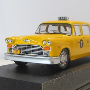 Checker Taxi New York City 1974, John Wick III 2019, Greenlight, Box. Diecast scale 1:43, Die cast model. German car replica. Brand new