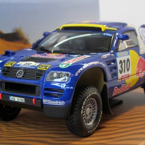 Volkswagen Race Touareg #310 Rally Dakar 2005, Minichamps, Box. Diecast metal car model 1:43. Concept car replica. collectible present.