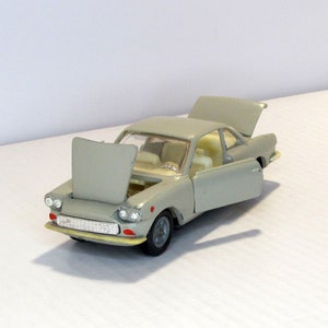 Fiat-Siata 1500, made in USSR, 1980s. Vintage collectible car. scale diecast model 1:43. Italian car replica. Antique collectible present.