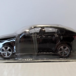 BMW X6 Supercars, DeAgostini. in a sealed blister. Collectible car. scale diecast model 1:43. luxury car replica. collectible present.