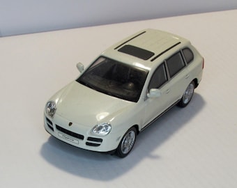 Porsche Cayenne, Cararama Box. Collectible metal toy car. scale diecast model 1:43. Replica German Sports car. luxury car models. scale car