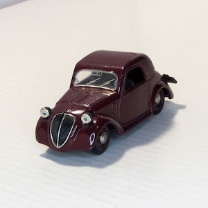 Simca 5, Brumm. made in Italy 1990s . Vintage collectible car. scale diecast model 1:43. replica small red car. retro car. collectible gift