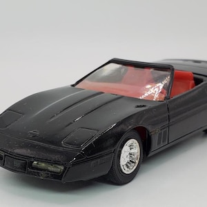 Chevrolet Corvette Solido 04-89, France. Vintage collectible toy car. scale die-cast model 1:43. American car replica. Convertible coupe