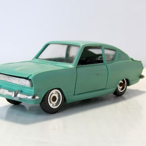 Opel Cadet A13, remake USSR 1970s. Vintage collectible car scale model 1:43. plastic toy car USSR 70s. replica car.  Scale Vintage Car
