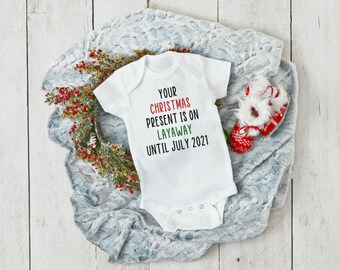 Your Christmas Present Is On Layaway Christmas Pregnancy Announcement bodysuit Pregnancy Announcement Reveal Onesie/® Best gift ever Family Baby Reveal