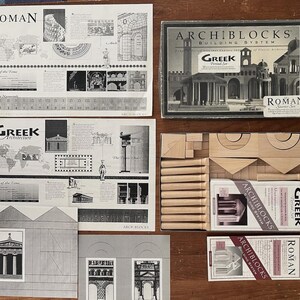 May include: An overhead shot of an educational toy set, "ArchiBlocks Building System," with a "Greek Period Set" and a "Roman Starter Set." The image includes architectural diagrams and wooden blocks, ideal for learning about classical architecture.