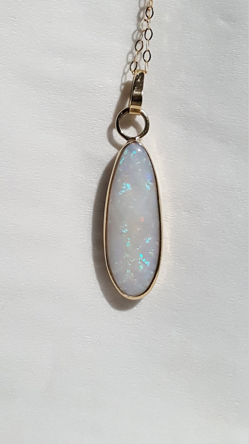 hand made, 5.8 carat Opal gold pendant 9 carat gold