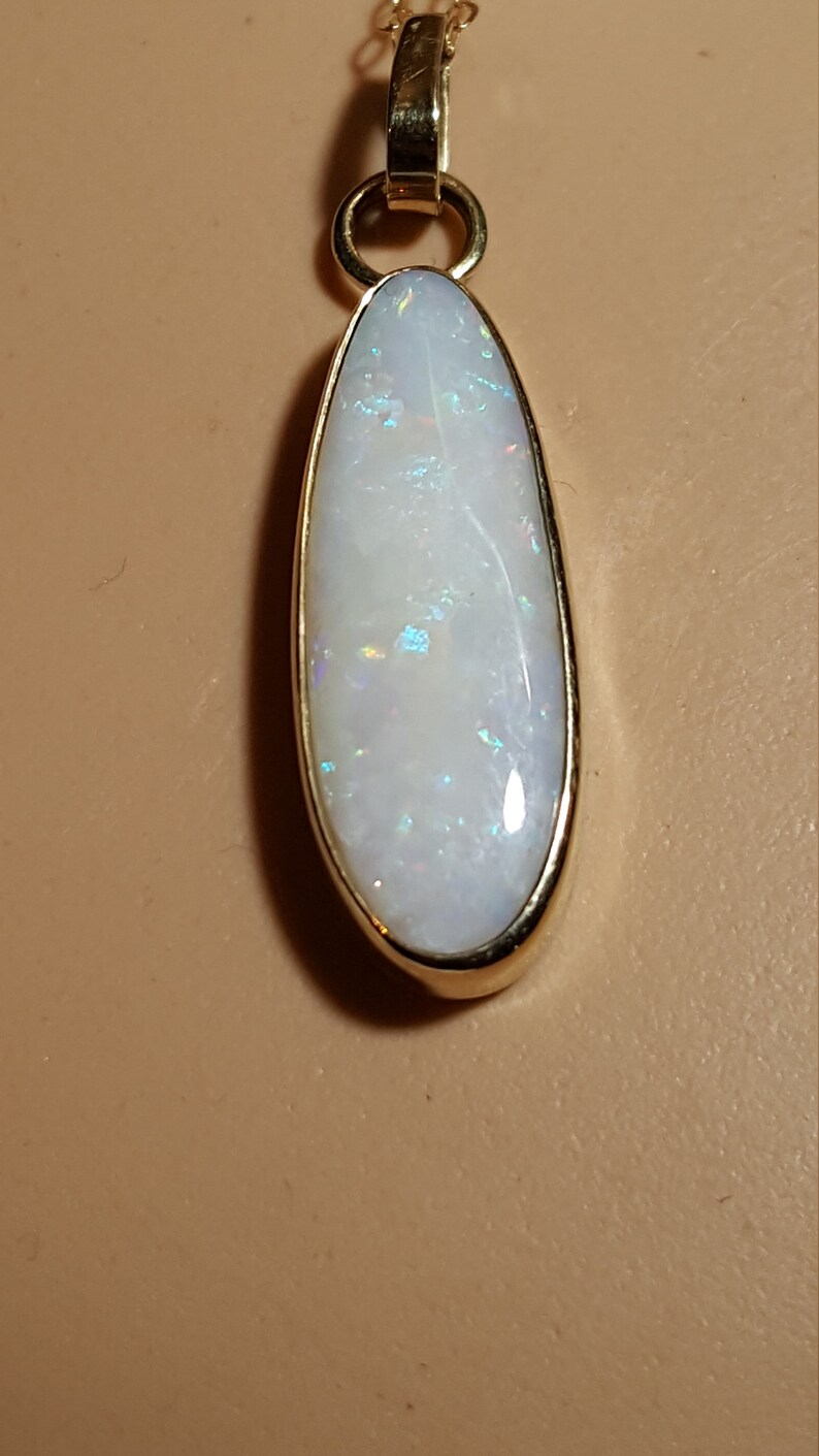 hand made, 5.8 carat Opal gold pendant 9 carat gold