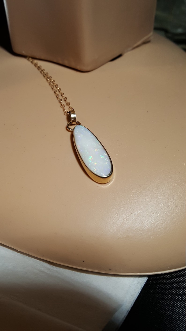 hand made, 5.8 carat Opal gold pendant 9 carat gold