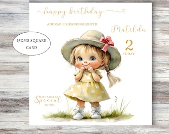 May include: A 15cm square birthday card featuring a watercolor illustration of a child in a yellow polka dot dress and a wide-brimmed hat with a pink bow. Text reads: happy birthday, ADORABLE GRANDDAUGHTER, Matilda, 2 TODAY!, HAVE A DAY AS SPECIAL AS YOU!