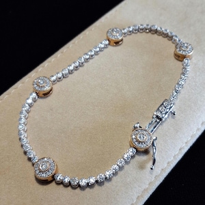 May include: A set of three ceramic mugs with a speckled, matte finish. The mugs are in shades of cream, light gray, and dark gray. Each mug has a simple, minimalist design, perfect for coffee or tea.