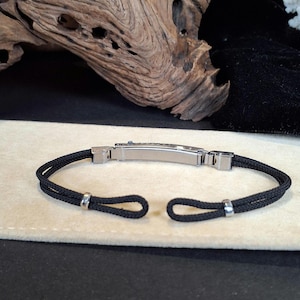 Refurbished Pontiac Watch Band, Black Cord Ladies 6.10" - 6.50" with Adjustable Deployment Clasp. Findings Have Minor Scuffs with New Cord.