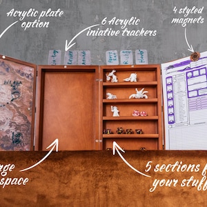 May include: A wooden tabletop game organizer with an acrylic plate option, six initiative trackers, and five sections for storage. The organizer has a large safe space and includes four styled magnets. The text on the acrylic trackers is blurry.
