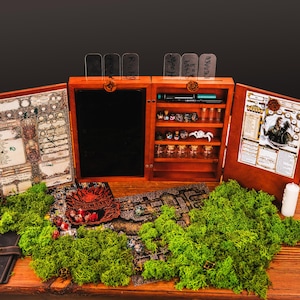 May include: A wooden tabletop gaming set with a central compartment, shelves, and hinged panels. The set includes dice, vials, and character sheets. Green moss and a leather-bound notebook are also present.