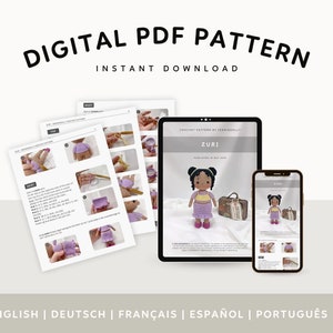 May include: Digital PDF crochet pattern for a doll named Zuri. The pattern includes instructions in English, German, French, Spanish, and Portuguese. The doll is wearing a purple dress and yellow top. The pattern is available for instant download.