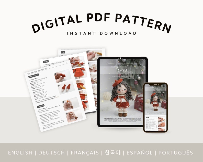 May include: Digital PDF pattern for crocheting a doll named Susie. The pattern includes instructions in English, German, French, Korean, Spanish, and Portuguese. The doll is wearing a red dress, a white beret, and a gray cardigan. She has brown hair and brown eyes.