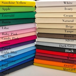 May include: A stack of fabric swatches in various colours, including sunshine yellow, apple green, emerald green, bottle green, lilac, baby pink, candy pink, cerise, purple, light blue, sky blue, turquoise, teal, royal blue, navy, white, ivory, cream, natural, beige, taupe, brown, silver, dark grey, black, red, wine, damson, orange, and mustard.