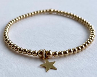 Gold filled beaded bracelet with star charm, Womens stretch bracelet, Gift for her