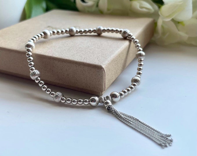 Handmade Sterling Silver Charm Bracelet with Boho Tassel Accent