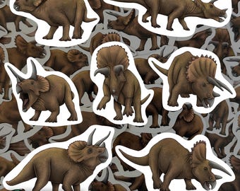 Może przedstawiać: Zestaw 10 naklejek z dinozaurami przedstawiającymi różne gatunki dinozaurów w odcieniach brązu i beżu. Naklejki są wydrukowane na białym papierze i mają błyszczące wykończenie. Naklejki idealnie nadają się do dodania prehistorycznego akcentu do każdego projektu.