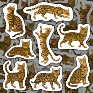 May include: A collection of Bengal cat stickers in various poses, including sitting, standing, and walking. The stickers feature the cats' distinctive spotted coat patterns in shades of brown and tan, with a white border against a gray background.