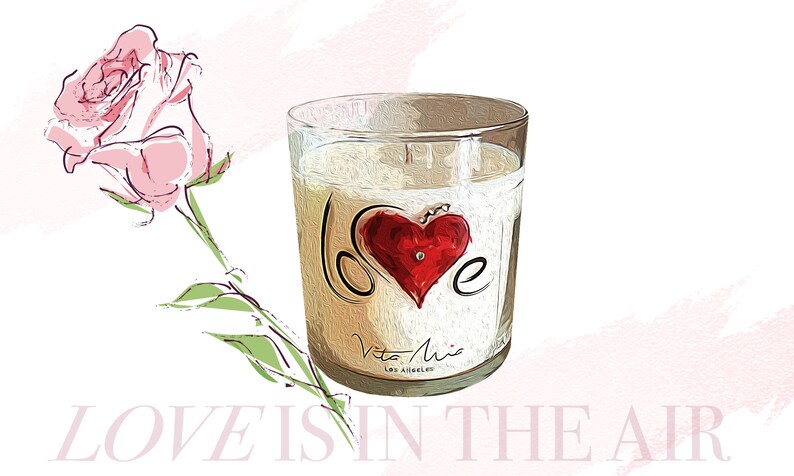 Candle gift set: a black sleek gift set adorned with a red ribbon. Love candle adorned with a clear label. Beneath, a black and white box. A white tip 4in matchstick in a glass vial