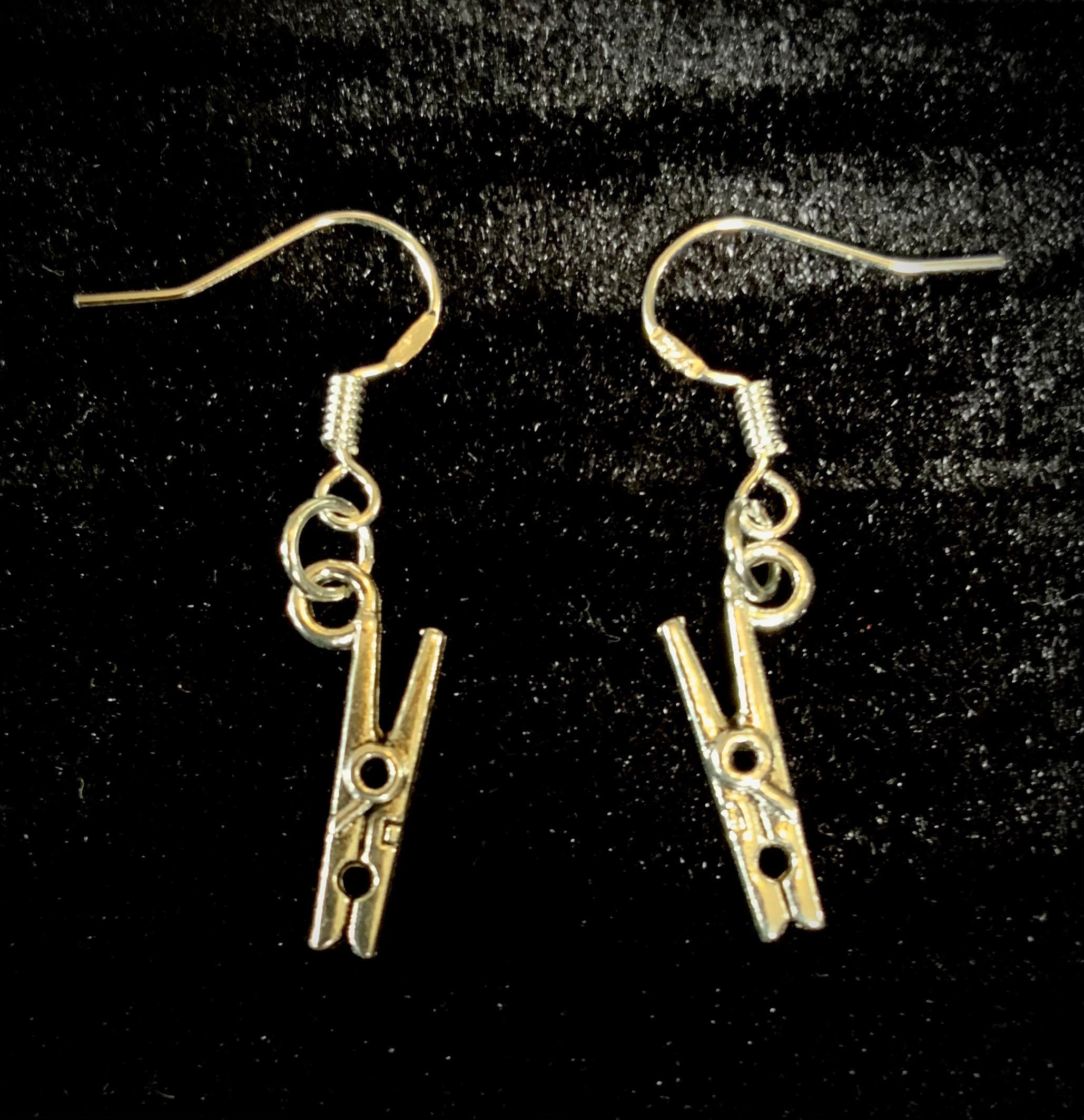 Peg earrings deals