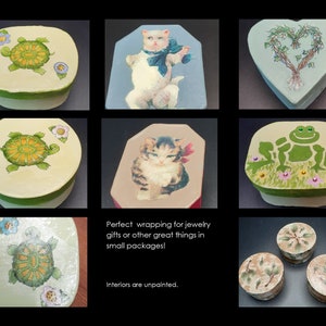May include: Assortment of small, round, heart-shaped, and octagonal boxes with various painted designs. The designs include a turtle, a frog, a cat, and a floral pattern. The boxes are perfect for storing small items like jewelry or trinkets.