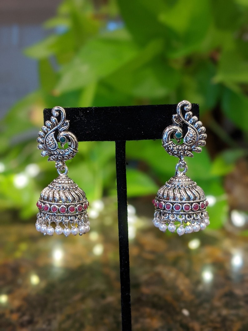 German silver jhumka with peacock design oxidized jhumka