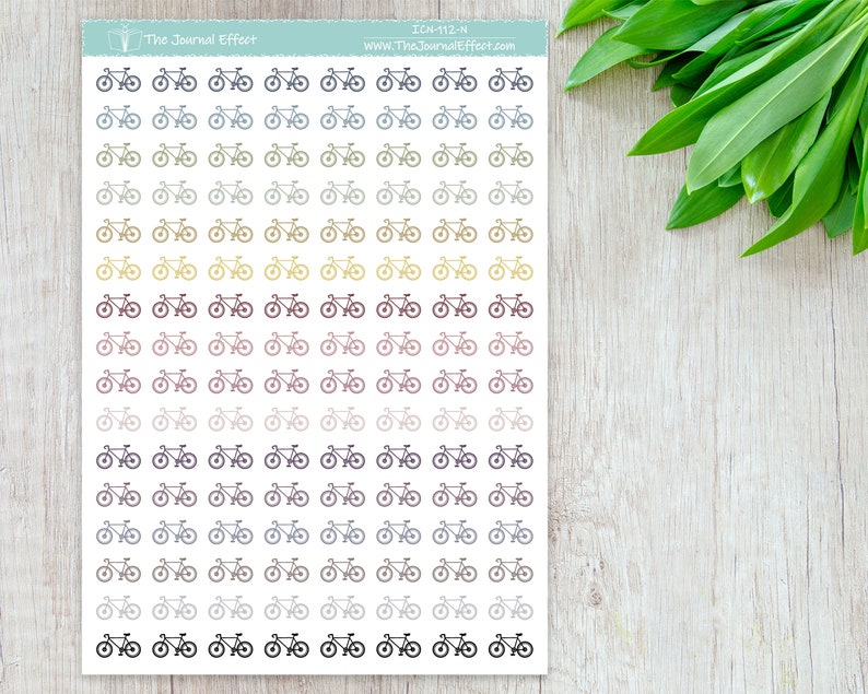 May include: A sheet of 60 small, black and white bicycle stickers. The stickers are arranged in 6 rows of 10. The stickers are in a gradient of colors, starting with light blue and ending with dark brown.
