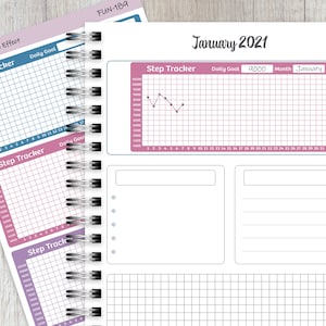 May include: A pink and blue planner with a step tracker for January 2021. The daily goal is set at 9000 steps. The planner has a gridded section for notes and a blank section for writing.