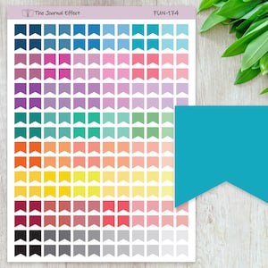 May include: A sheet of colorful flag stickers with a variety of colors, including blue, pink, purple, teal, orange, yellow, red, and gray. The sheet is labeled "FUN-174" and "The Journal Effect".