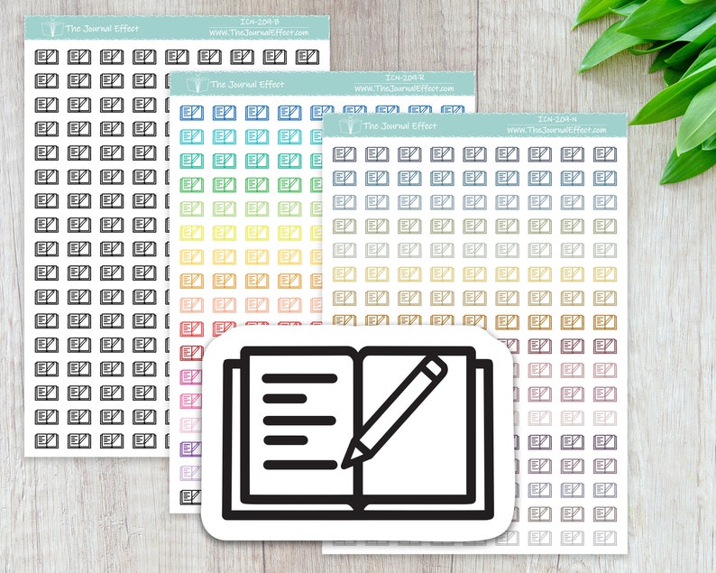 May include: Three sheets of colorful stickers with a black and white illustration of an open notebook with a pencil on the right page. The text "The Journal Effect" is printed on each sheet.