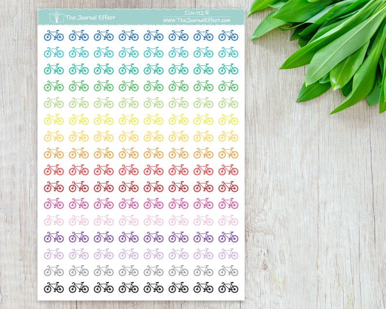 May include: A sheet of rainbow colored bicycle stickers. The stickers are arranged in rows of 6, with each row featuring a different color. The colors are blue, teal, green, yellow, orange, red, pink, purple, gray, and black. The stickers are all the same size and shape, and they feature a simple outline of a bicycle.