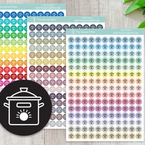 May include: Three sheets of colorful planner stickers featuring a pot icon. The stickers are arranged in rows of circles, with a variety of colors including blue, green, yellow, orange, red, purple, and neutral tones. The text "The Journal Effect" is visible.